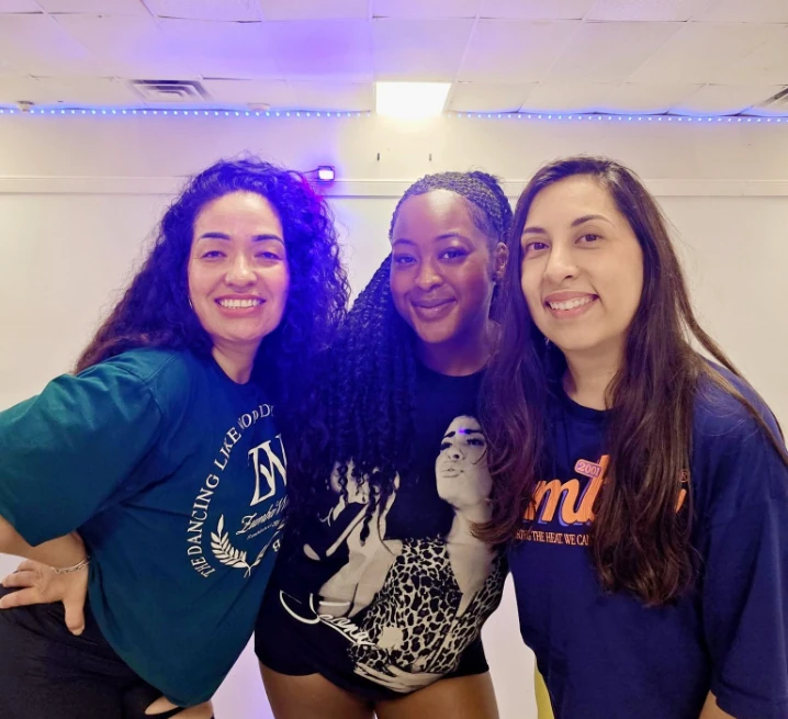 Three Macarena's Fitness Studio members smiling together